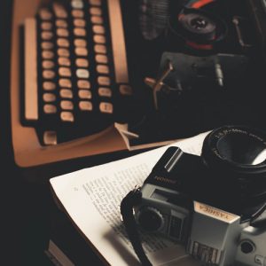 vintage typewriter and camera